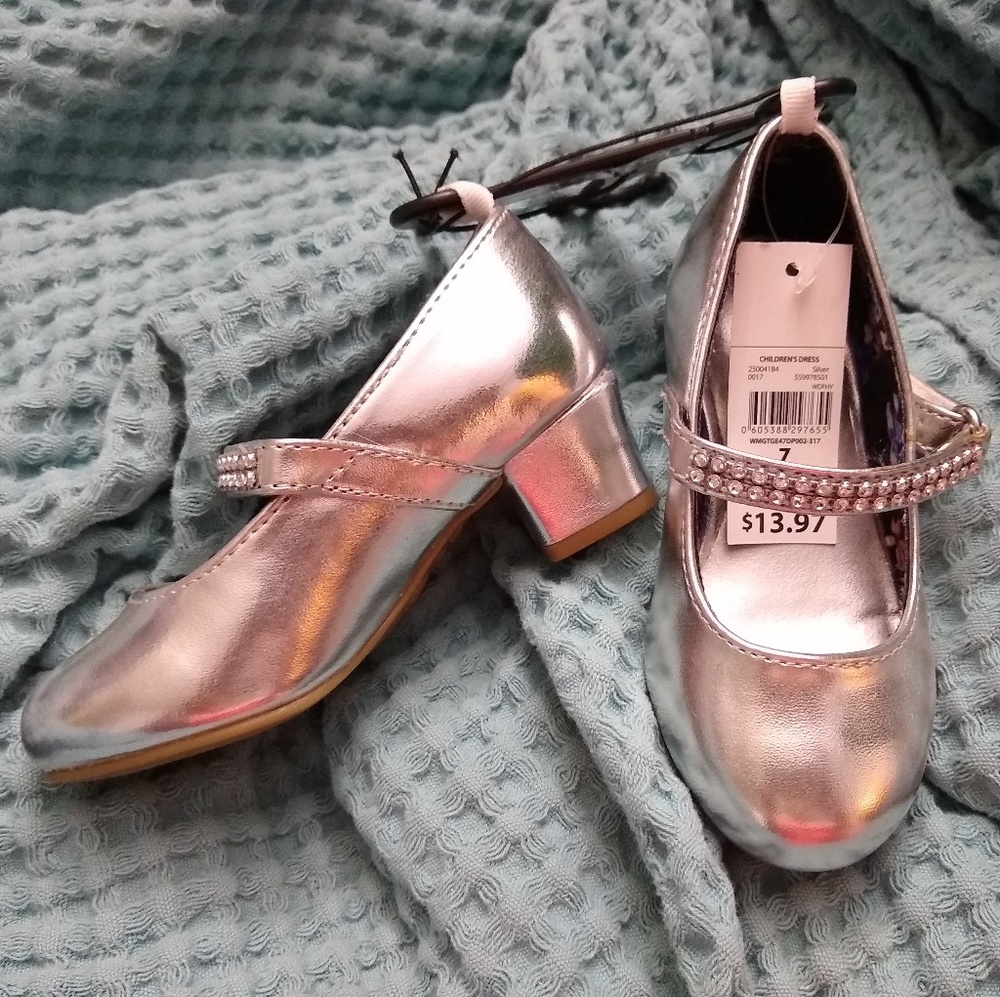 Adorable little girl silver heels